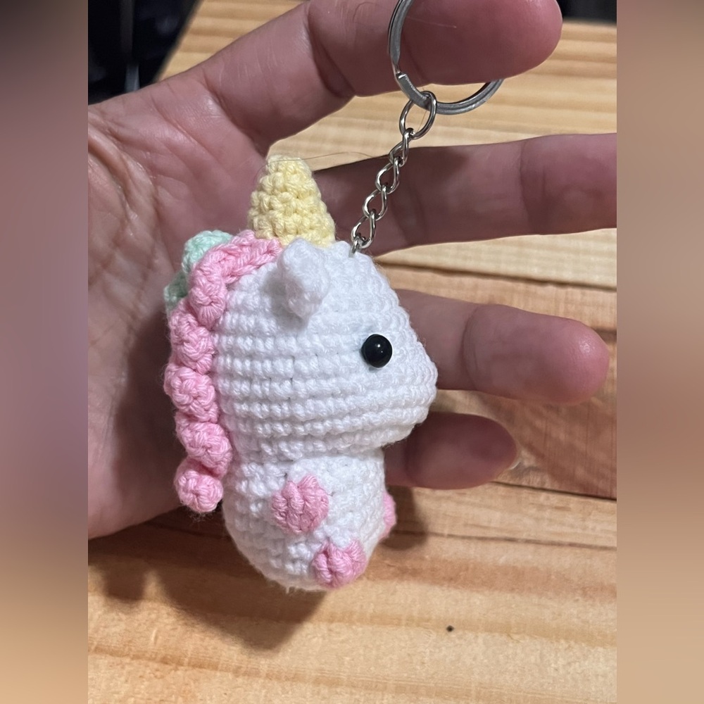 Handmade crocheted amigurumi unicorn keychain